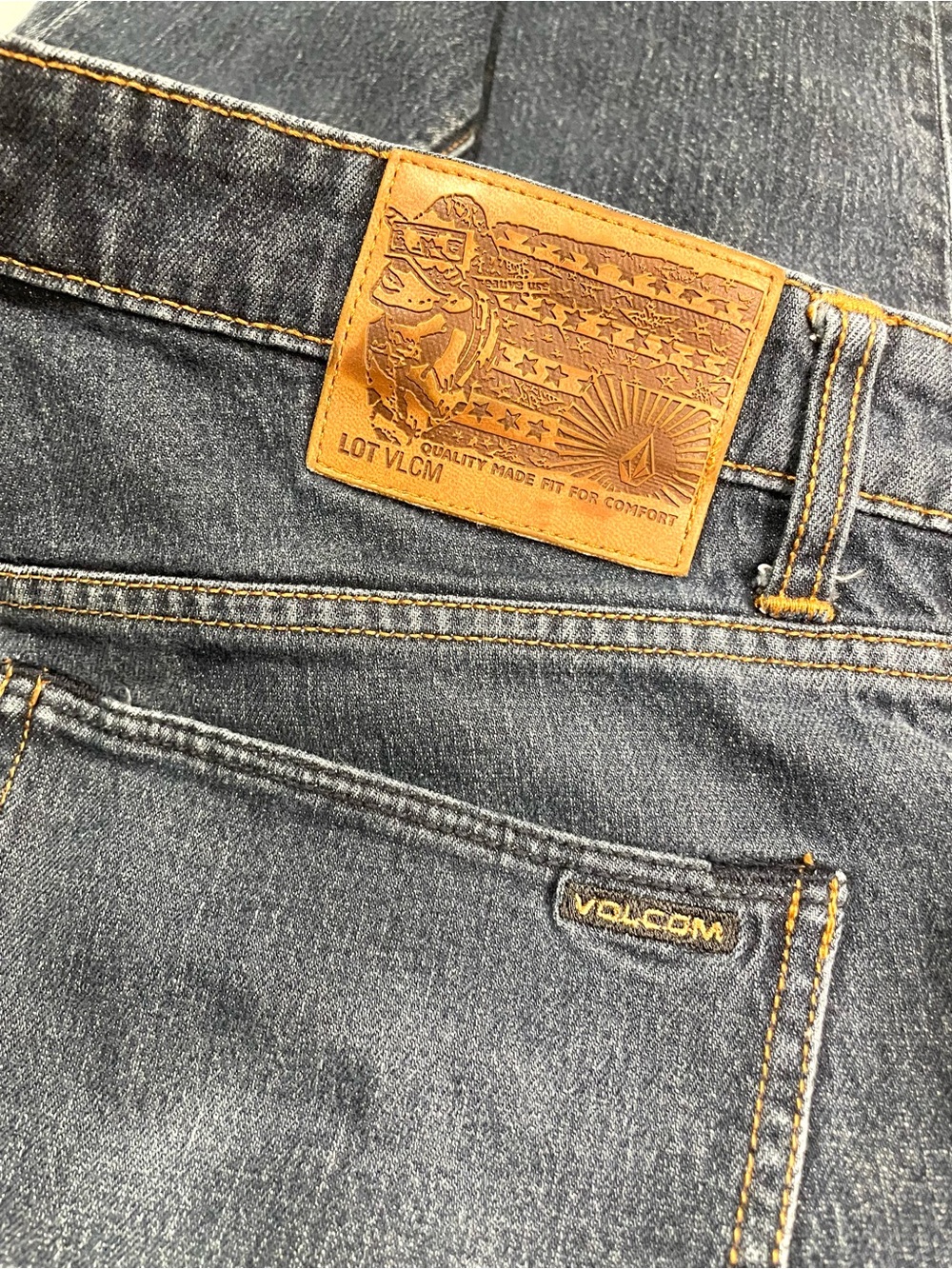 Volcom Men's 32 Dark Blue Jeans with Contrasting Tan Patch